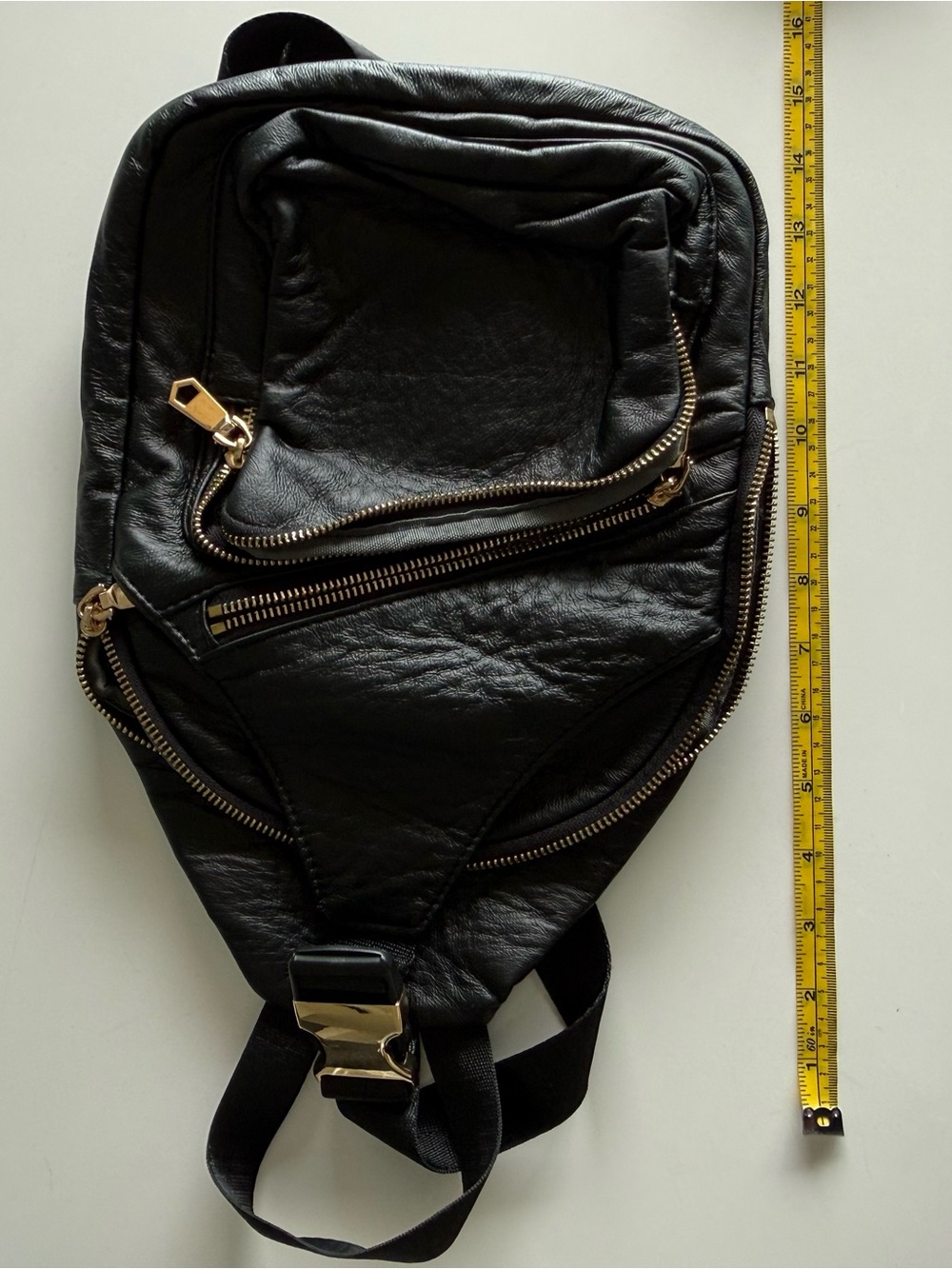 Black Leather Sling Bag with Gold Zippers